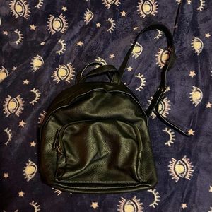 Black pleather mini back pack! Super cute and minimalistic with lots of pockets